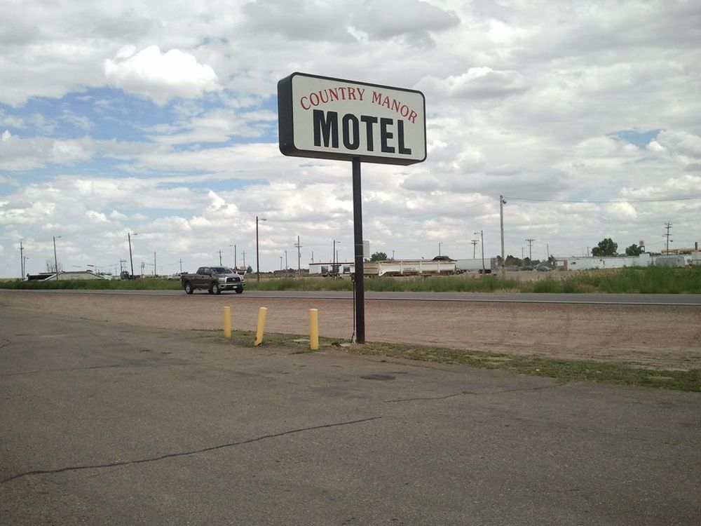 Country Manor Motel Watkins Экстерьер фото